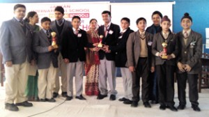 Winners of Quiz Competition posing alongwith trophies at Banyan International School in Jammu.