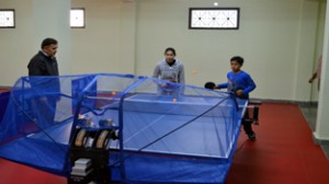 Table tennis coach Ramesh Magotra honing skill of players at Jammu Tennis Academy on Saturday.