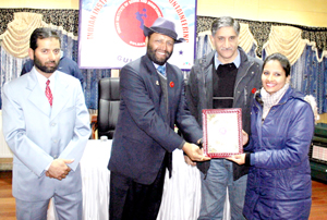 Dignitaries presenting trophy to participant of 2nd Skiing course at Gulmarg on Saturday.