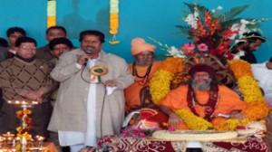 Minister for Housing Raman Bhalla addressing gathering at religious function on Wednesday.