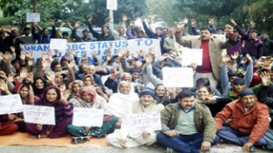 Jat community members raising slogans during protest at Jammu on Saturday.