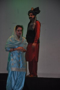 Sapna Soni and Parveen Sharma in a scene from Punjabi play “Lahore Di Chitthi Amritsar De Naa” staged on Saturday.