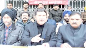 JCC leader Abdul Qayoom Wani addressing press conference in Jammu on Friday.