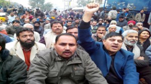 State Govt employees  staging protest dharna near Press Club in Jammu on Wednesday. -Excelsior/ Rakesh