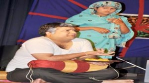 Ravinder Sharma and Kanika Sharma in a scene from Dogri play ‘Malikka Da Khas Slahakar’ staged on Friday.            —Excelsior/Rakesh