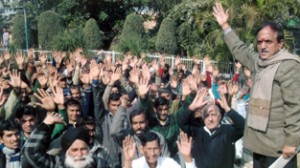 Subash Shastri, president NMC along with other workers  protesting for their demands on Sunday.