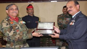 Lt Gen Sanjiv Chachra presenting a memento to Air Marshal S S Soman during interaction at Northern Command HQ on Tuesday.