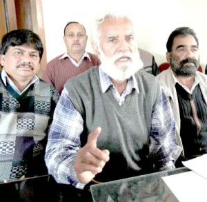 PHE Workers Union leader Bakshi Singh addressing press conference in Jammu on Friday.        -Excelsior/ Rakesh