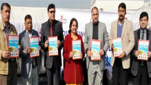 MoS Health Shabir Ahmad Khan and others releasing newsletter at Jammu on Saturday.