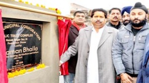Minister for Housing Raman Bhalla laying foundation stone of Sulabh Toilet Complex at Nanak Nagar on Friday.