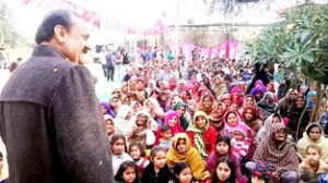 MLA Surjeet Singh Slathia addressing public gathering at Vijaypur on Sunday.