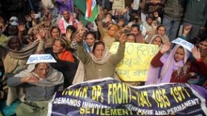 PoK refugees holding protest at Jammu on Wednesday.-Excelsior/ Rakesh 
