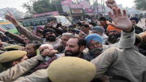 VRS employees raising slogans during protest march at Jammu on Friday.—Excelsior/Rakesh