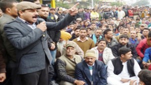 MLA Balwant Singh Mankotia addressing protestors at Udhampur on Saturday.