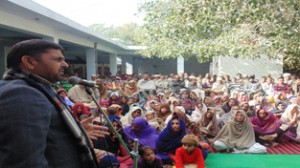 MP Madan Lal Sharma addressing a public gathering at village Lalyal in Raipur-Domana constituency on Thursday.