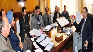 Minister for CAPD, Ch Mohd Ramzan chairing a meeting of officers at Jammu on Wednesday.