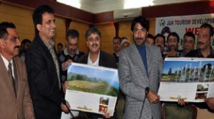 Minister for Tourism Ghulam Ahmad Mir releasing calendar of JKTDC at Jammu on Thursday.