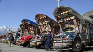 Pakistani trucks with drivers waiting nod to cross over to PoK.  —Excelsior/Aabid Nabi