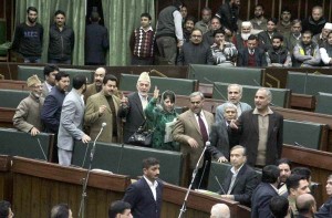 PDP MLAs led by Mehbooba Mufti staging a walk-out in the Assembly on Sunday. More pics on page 6 —Excelsior/Rakesh