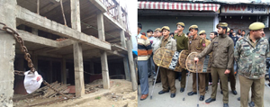 An underconstruction building sealed by administration in Katra town amidst huge deployment of police personnel.