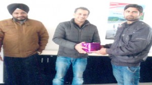Gifts being distributed among the guests during a meet of Alfa Load Operators in Jammu on Saturday.