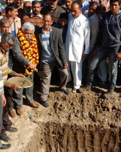 Minister for Planning Ajay Sadhotra laying foundation stone of community hall at Jammu on Wednesday.
