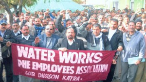 PHE employees holding protest demonstration at Katra on Saturday.