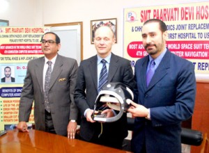 Dr Guriqbal S Chinna along with Dr Heiko Graichen displaying recently launched sterile closed air circuit helmet systems at Smt Paarvati Devi Hospital, Amritsar.