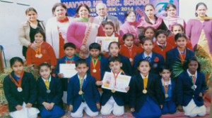 Prize winners of Nav Yug HSS posing alongwith Staff members in Jammu on Wednesday.