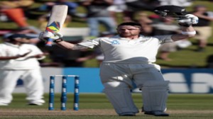 New Zealand's Brendon McCullum celebrating century against India during the second innings on day three of the second Test at Basin Reserve in Wellington on Sunday. (UNI)