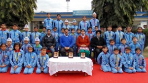 Karatekas of Air Force School Jammu posing for a group photograph alongwith the School Management.