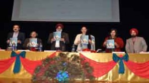 Prof Mohan Paul Singh Ishar, Vice Chancellor, University of Jammu and chief  guest of the conference releasing the souvenir on Friday.