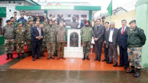 GOC Chinar Corps, Lt Gen Gurmit Singh unveiling bust of Maj Pramod Purushottam at Badamibagh Cantonment, Srinagar on Saturday.