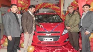 Sourabh Bhagat, Transport Commissioner unveiling new Beat-2014 in the presence of Raju Choudhary, Managing Director, Sanjay Mahajan, Ankur Mahajan, Director of the company on Friday. -Excelsior/Rakesh