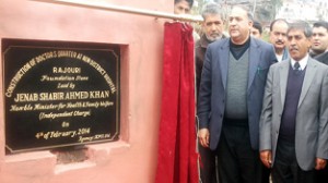 MoS Health, Shabir Ahmad Khan laying foundation stone of staff quarters at DH Rajouri on Tuesday.