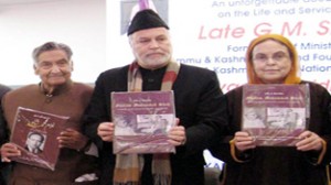 Dignitaries releasing book on the life of late G M Shah at Jammu on Saturday.-Excelsior/Rakesh