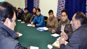 DDC Mubarak Singh chairing a meeting at Doda on Saturday.