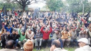 People staging protest dharna at Jandrah on Tuesday.