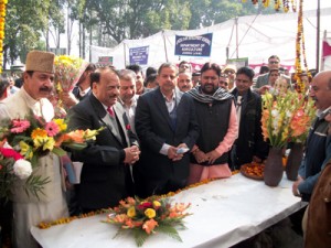 MLA Radhay Sham Sharma and others inspecting a stall at Kisan Mela on Monday.