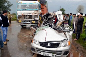 The Santro car which met with accident on National Highway at village Baghail Pali on Tuesday. —Excelsior/Madan