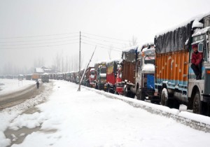 A queue of stranded trucks at Qazigund on Tuesday. More pics on page 3. —Excelsior/Sajad Dar
