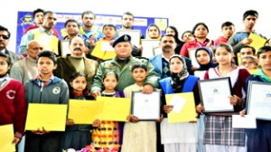 Winners posing for a group photograph alongwith dignitaries during Choona Hai Aasman Talent Hunt Programme in Rajouri.