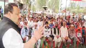 Provincial President  NC Devender Singh Rana addressing public meeting at Nagrota on Sunday.