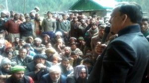 MLA Inderwal G M Saroori addressing public meeting at Gandoh.