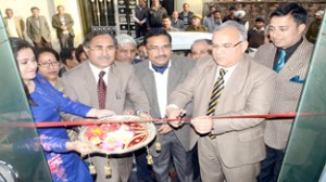 Principal Secretary, Planning and Development Department, B R Sharma inaugurating “The Civils”—IAS/KAS Coaching Institute at Roop Nagar on Monday.