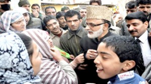 Minister for Rural Development, Ali Mohammad Sagar interacting with people during his tour of Srinagar City on Sunday.