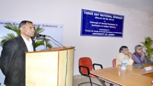 Dignitary expressing his views during inaugural ceremony of national seminar at Jammu University on Wednesday.