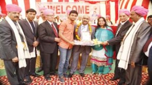 Mahajan Sabha leaders giving away awards to community members at Jammu on Sunday.       —Excelsior/Rakesh