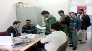 Doctors examining students and staff during medical camp at Baba Ghulam Shah Badshah University at Rajouri.