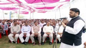 Congress candidate for Jammu-Poonch constituency Madan Lal Sharma addressing a meeting at Jammu on Sunday.